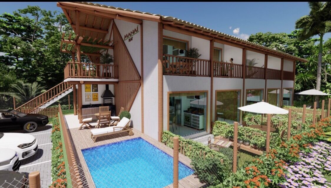 RCM Construção - Fachada do Residencial Manai com piscina e área de lazer ao ar livre.